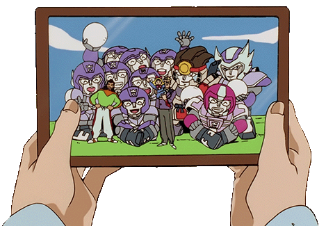 Two hands holding a framed photo containing the initial members of the Silver Castle team.